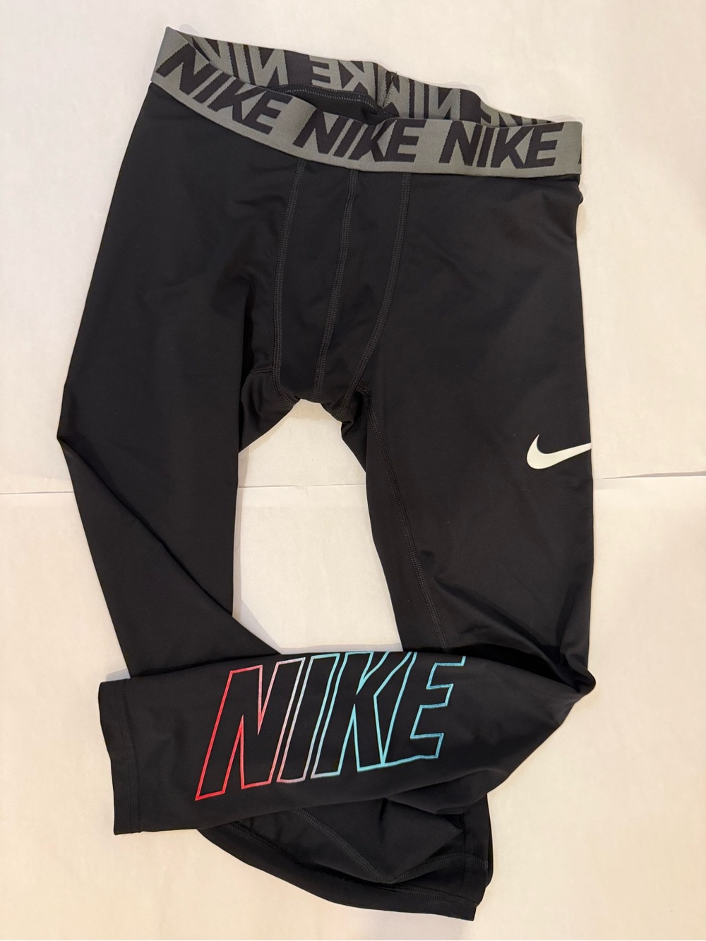 Nike Black Leggings with Red & Teal Logo Accents